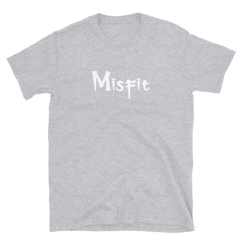 May include: A heather grey short-sleeved t-shirt with the word "Misfit" printed in white on the front.