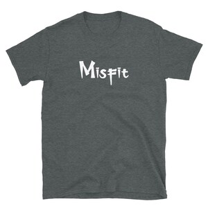 May include: A dark heather grey t-shirt with the word "Misfit" printed in white on the front.