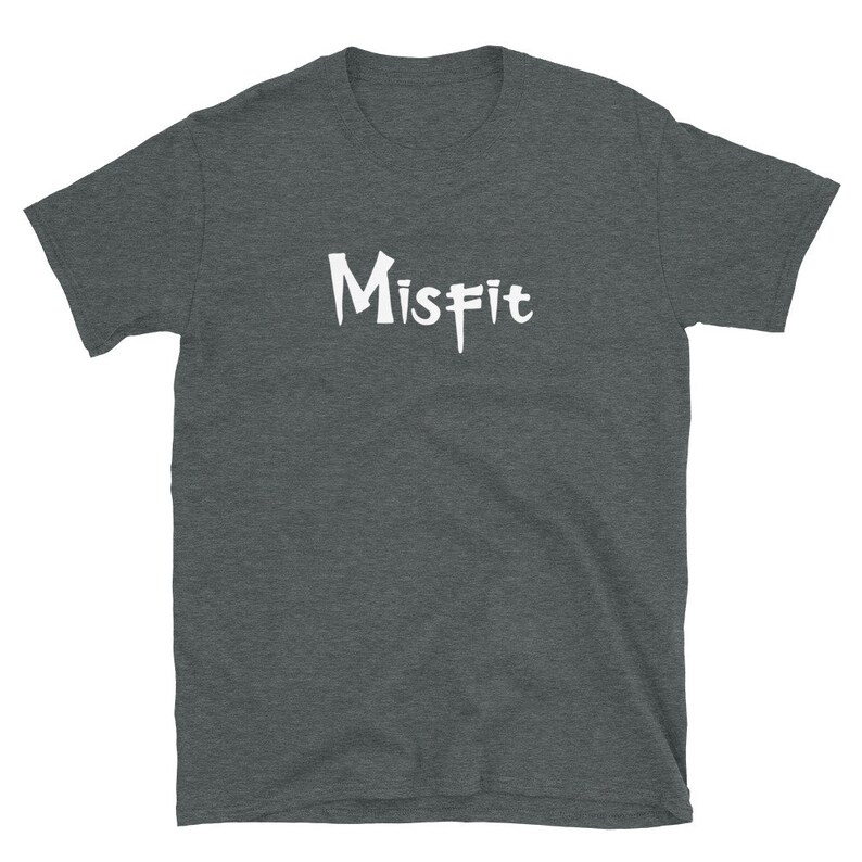 May include: A dark heather grey t-shirt with the word "Misfit" printed in white on the front.