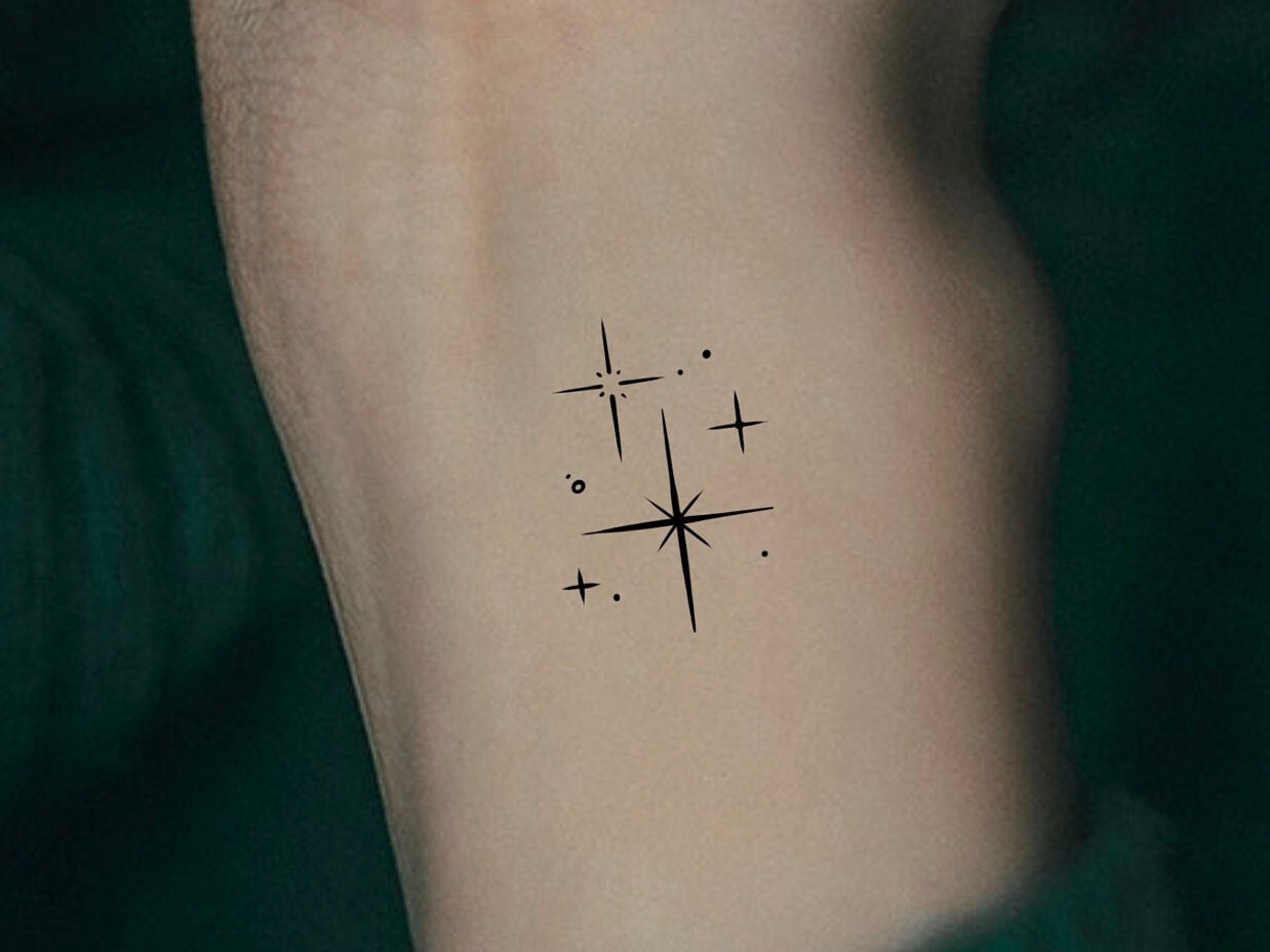 Stunning Star Tattoos Behind the Ear