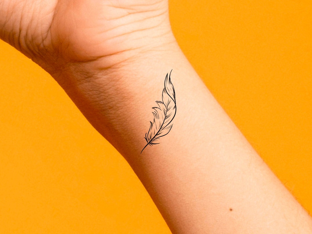 Minimalist Feather Tattoo Idea  BlackInk AI