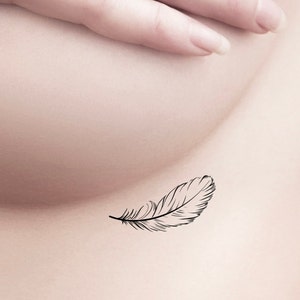 Simple feather with small birds  VN Tattoo Studio  Facebook