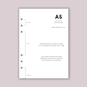 May include: White A5 planner insert with measurements in centimeters and inches. The insert is labeled "A5" with dimensions of 5.8 x 8.3 inches and 14.8 x 21 cm. Text includes "takenoteplannerco" and instructions for custom orders.