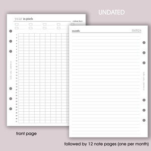 May include: Two-page planner insert with the text "year in pixels" and "UNDATED". The left page features a grid for tracking, while the right page is lined for notes. The bottom of the image reads "followed by 12 note pages (one per month)".