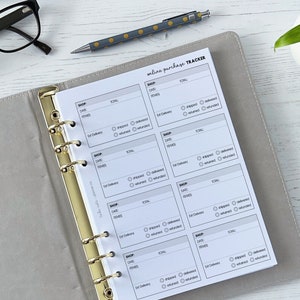 May include: A white, six-page online purchase tracker with a gold binder. The tracker has sections for shop, date, total, items, estimated delivery, shipped, delivered, returned, and refunded.