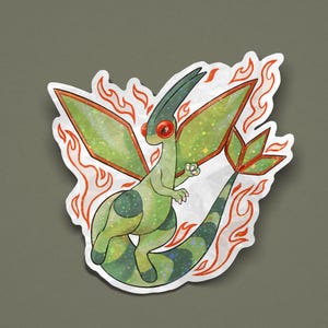 Puede incluir: Una pegatina con un dragón de dibujos animados verde y negro con ojos y alas rojas. El dragón está rodeado de llamas naranjas. La pegatina tiene un borde blanco.