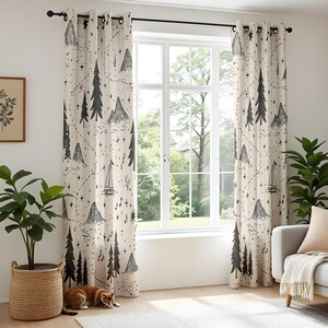 May include: A pair of off-white curtains featuring a repeating black line-art pattern of pine trees, mountain peaks, sailboats, and small stars. The curtains are hung on a black rod with metal grommets and display a continuous outdoor-themed print.