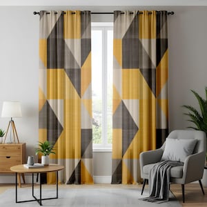 May include: A pair of floor-length curtains featuring a geometric pattern of large triangles and rectangles in shades of mustard yellow, charcoal gray, and off-white. The curtains are hung on a black rod with metal grommets at the top edge.