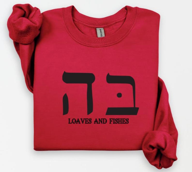 May include: Red long-sleeve sweatshirt with black Hebrew lettering and the text "Loaves and Fishes".