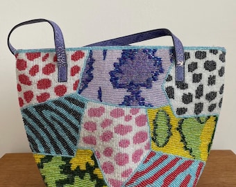 Handgemachte völlig wulstige Handtasche