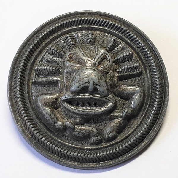 1 1800s Pewter or white metal antique button with repousse design of Aztec God Quetzalcoatl.  1 3/4 " or 44 mm dia.  MB126