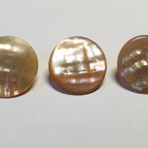 3 assorted shell Mother of Pearl buttons circa 1900s. All with metal loop shanks. 7/10&quot; by 18mm. NM233