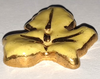 Yellow French ceramic button with gold lustre. Vintage. Leaf design. Circa 1940s. 2 sewing holes. 7/8 &quot; by 3/4&quot;. PB131