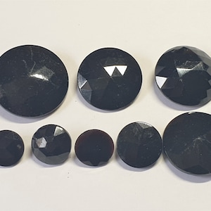 8 black faceted glass Victorian buttons. 6 with metal shanks. 1 large, 3 medium and 4 small. Job Lot. 1890s. Sizes: 9/16&quot;  to 1 1/4&quot;. GB137