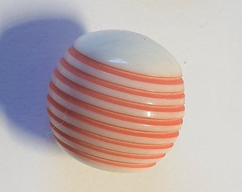 White casein domed button with red stripes. Circa 1940s. Casein button. Self shank. 7/16 inch or  12 mm.  CB377