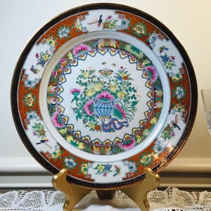 Vintage Chinese Famille Rose Porcelain Plate. 10 Inches Across Hand Painted Flower and Insect Design. 24k Gold Trim. Jingdezhen Porcelain.