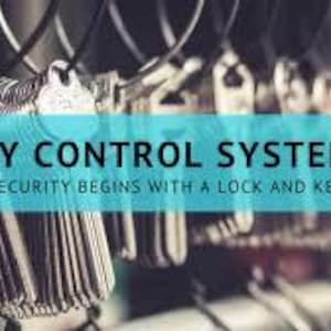 May include: A collection of keys hanging from a rack, with a teal banner across the image that reads "KEY CONTROL SYSTEMS" and "SECURITY BEGINS WITH A LOCK AND KEY". The keys are silver and organized.