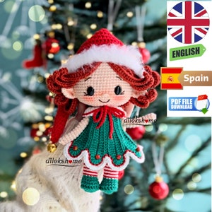May include: Crochet pattern for a Christmas elf doll with red hair, a green dress, and a red hat with white trim. The doll is holding a red bell in its hand.