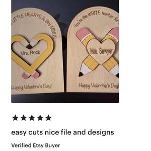 May include: Two wooden Valentine's Day gifts for teachers. One features a heart-shaped pencil with "Mrs. Rock" and "Happy Valentine's Day!" The other has crossed pencils with "Mrs. Sawyer" and "Happy Valentine's Day!"