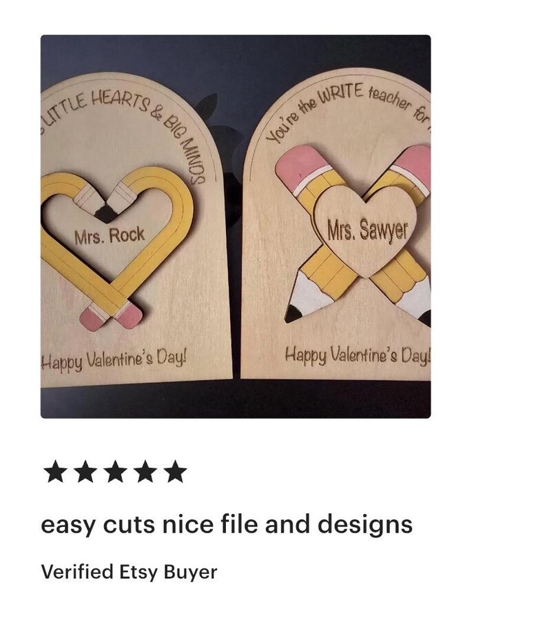 May include: Two wooden Valentine's Day gifts for teachers. One features a heart-shaped pencil with "Mrs. Rock" and "Happy Valentine's Day!" The other has crossed pencils with "Mrs. Sawyer" and "Happy Valentine's Day!"