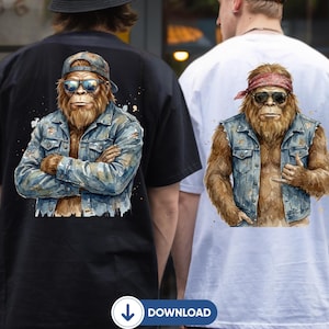 May include: Black and white t-shirt featuring a watercolor illustration of a Bigfoot wearing a denim jacket, sunglasses, and a baseball cap. The Bigfoot has crossed arms. The other shirt is white with a similar Bigfoot illustration, but with a red bandana.