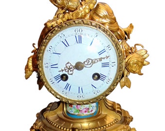 Stunning antique gilt metal mantel clock with hand-painted porcelain panels, luxury, 19th century, French, sea nymphs, bird & floral finial