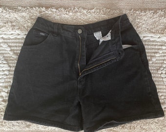 May include: Black denim shorts with a zipper fly and a small Lee logo on the back pocket.