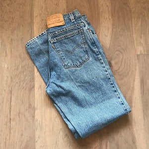 Vntg 90’s Size 10 Med Levi’s  Jeans, Relaxed Fit Tapered leg Made in USA, Orange Tab, Vintage Jeans