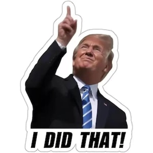 May include: A sticker showing a man in a black suit and blue tie, with his arm raised and finger pointing upwards. The text "I DID THAT!" is printed in bold, black letters at the bottom.