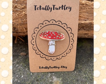 Red toadstool enamel pin badge