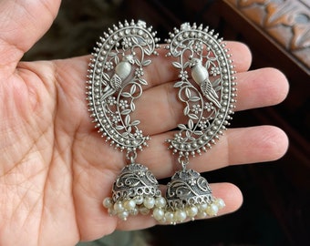 Silver look alike jhumka/earrings light weight/chic trendy/ peacock