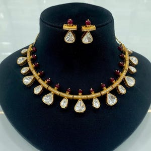 Premium quality Tyaani Sabyasacchi Inspired uncut Kundan goldtone,choker necklace set,earrings/ruby pink red  bead,Moissanite flexible hasli