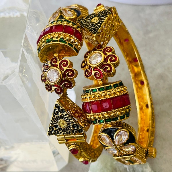 Pair of Temple openable bracelet with ruby, emerald color stones and carving traditional Indian kada with meenakari