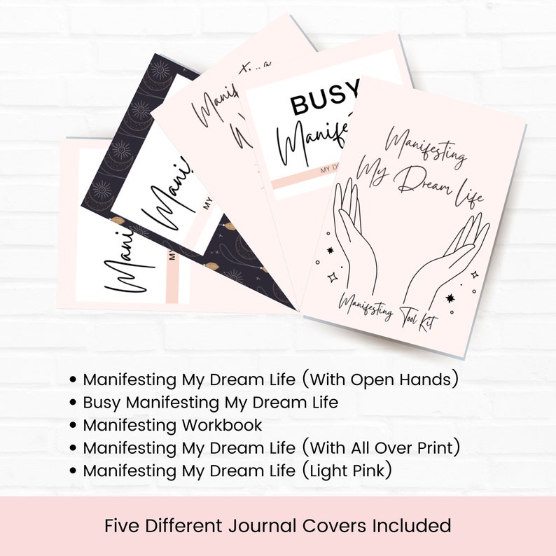 May include: Five different journal covers with pink backgrounds and black text. The covers feature the text "Manifesting My Dream Life" and various designs, including open hands, stars, and moons.