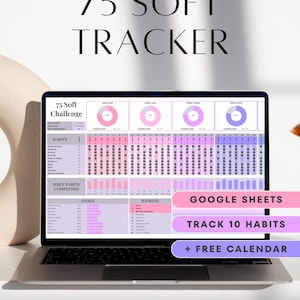 May include: A laptop displays a digital planner with the text "75 SOFT TRACKER." The screen shows a habit tracker with pink and purple charts, and the words "GOOGLE SHEETS," "TRACK 10 HABITS," and "+ FREE CALENDAR."
