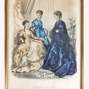 May include: A vintage illustration of three women in fashionable dresses from the 1800s. The women are standing in a room with a mirror and a plant. The illustration is titled "La Mode Illustree."