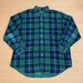 see more listings in the Button Ups section