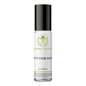 Pode incluir: Um frasco de vidro transparente com aplicador roll-on e tampa preta, apresentando um rótulo branco com um logótipo de borboleta verde, o texto AROMA SHORE, POWDER SOFT e a frase OUR IMPRESSION OF BABY POWDER TYPE, com texto de aviso.