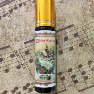 Winter Berries perfume oil roll on country fragrance raspberry strawberry mistletoe scent gift women present village lantern sparrows snow