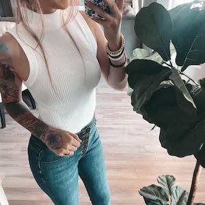 Black ribbed turtleneck bodysuit best sale