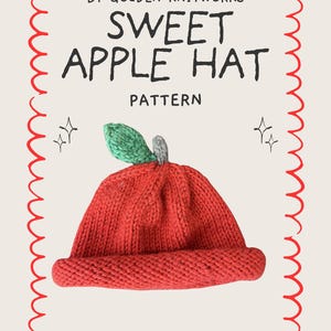 May include: A white ceramic mug with a black handle and the text "But First, Coffee" in a bold, black font. The mug is filled with a dark liquid, likely coffee, and sits on a light-colored surface.