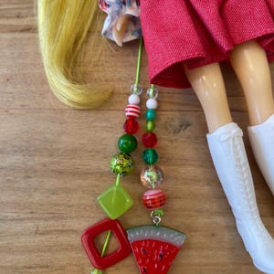 May include: A set of three ceramic mugs with a speckled, matte finish. The mugs are in shades of cream, light gray, and dark gray. Each mug has a simple, minimalist design and a rounded handle.