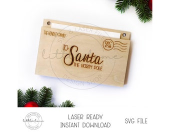 Könnte beinhalten: Ein hölzerner Briefhalter zum Thema Weihnachten mit den Worten "To Santa, The North Pole" eingraviert. Der Halter enthält den Text "The Hendley Family" und ein "Dec 25th" Stempeldesign. Das Design ist laserfertig und sofort zum Download verfügbar.