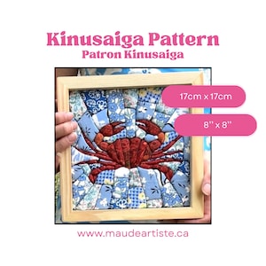 May include: A Kinusaiga pattern craft project in a light wood frame, featuring a central dark red crab surrounded by blue and white floral fabric pieces. The text reads Kinusaiga Pattern, Patron Kinusaiga, 17cm x 17cm, 8" x 8", and www.maudeartiste.ca.