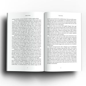 May include: An open book with white pages, displaying text in a serif font. The book is lying flat, with the left page labeled "Author Theme" and the right page labeled "Book Title". The pages are filled with paragraphs of text.