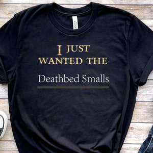May include: Black t-shirt with gold lettering that reads "I just wanted the Deathbed Smalls".