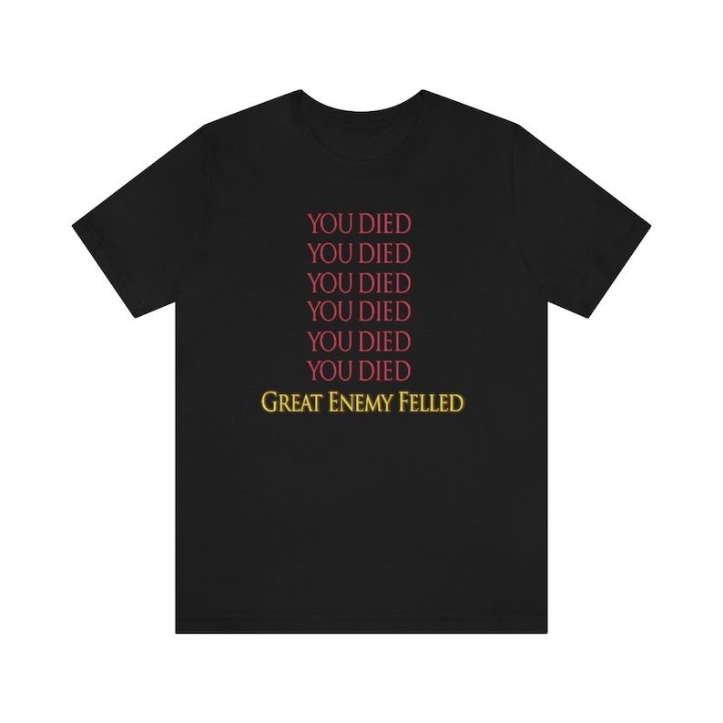 May include: Black t-shirt with the text "YOU DIED" repeated six times in red, followed by "GREAT ENEMY FELLED" in yellow.