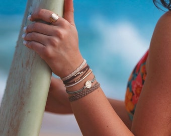 The Best Hair-tie Bracelets! Our CLIMB set includes 5 bracelets in beautiful summery neutrals, that also double as the best hair tie!