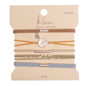 The Best Hair-tie Bracelets! Our GROW set includes 5 bracelets in muted earthy colors. Pull your hair up in style with these bracelets