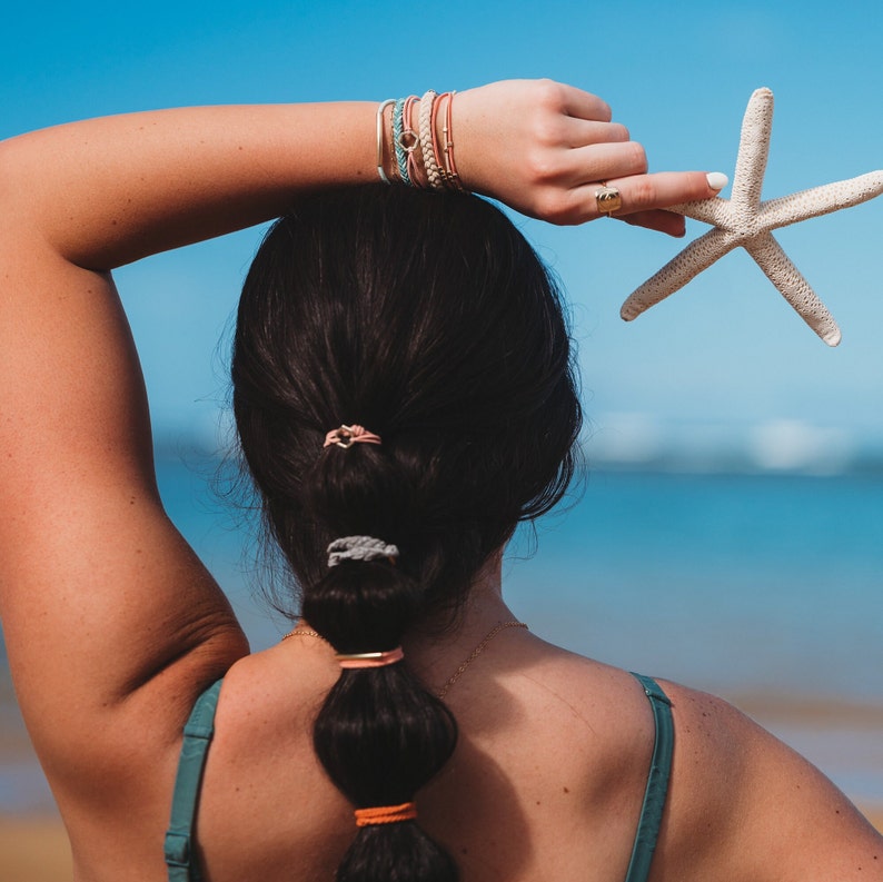 The Best Hair-tie Bracelets Our CLIMB set includes 5 bracelets in beautiful summery neutrals, that also double as the best hair tie image 7